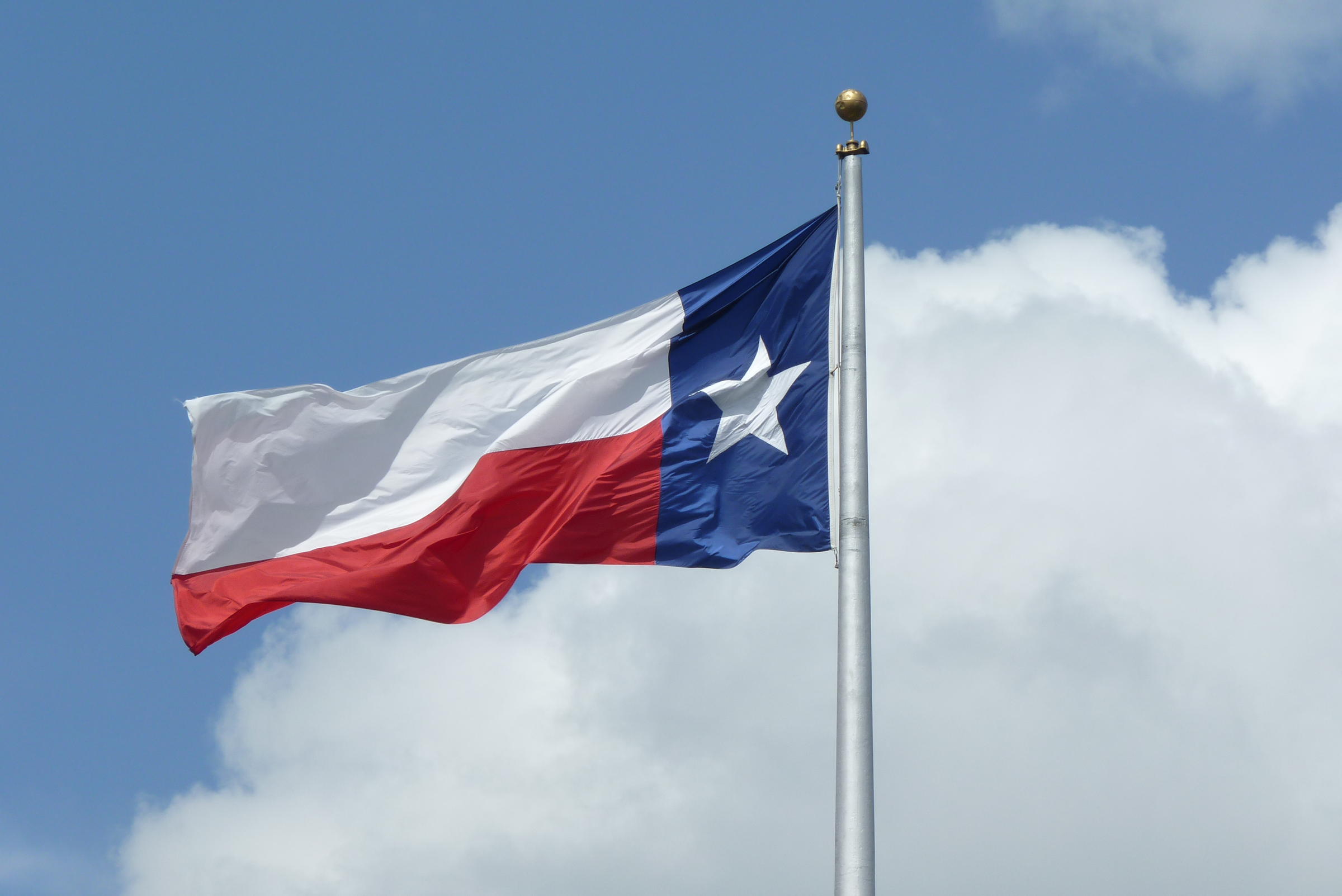 Texas Flag Waving in the Sky