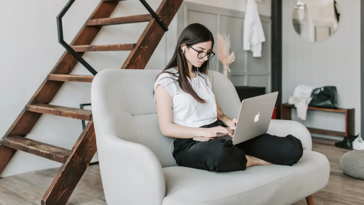 Woman listen to music while writing