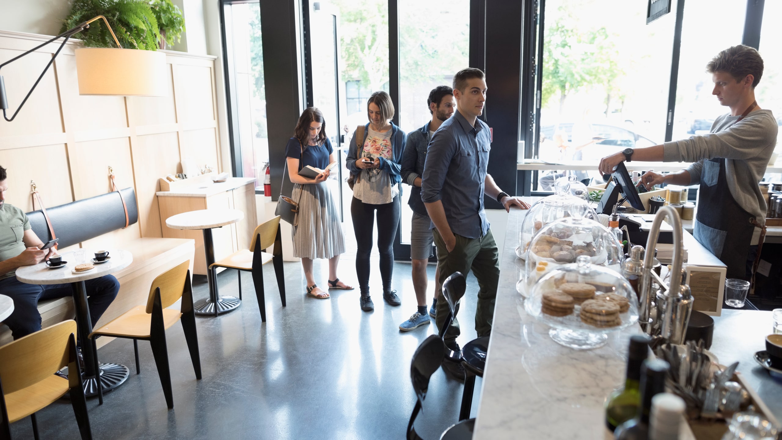 Customers waiting in a coffee shop