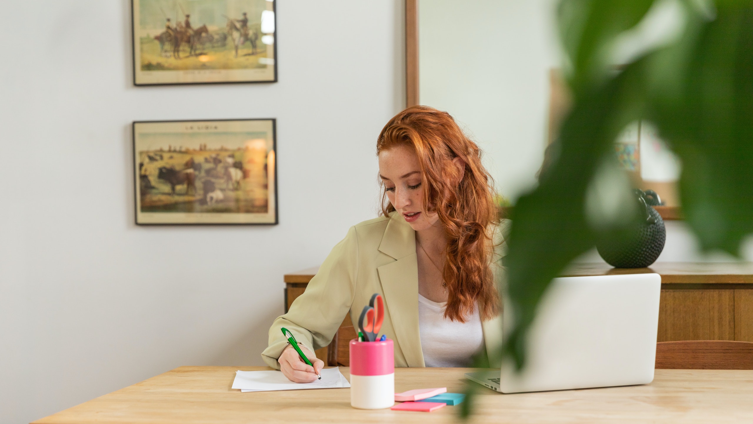 A woman doing office work.