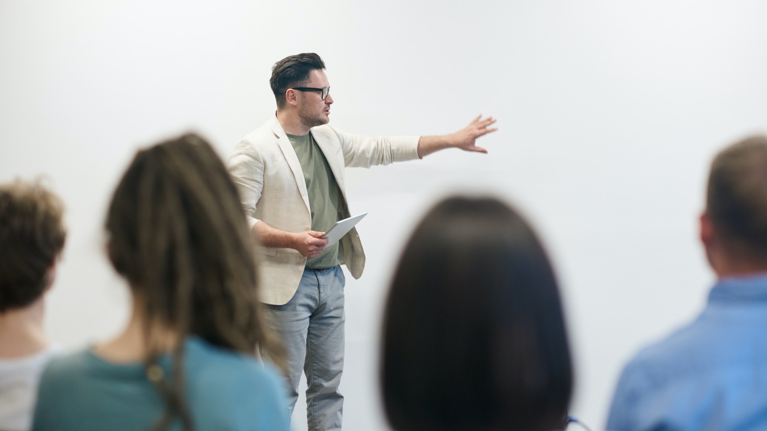 A man is presenting his ideas at work