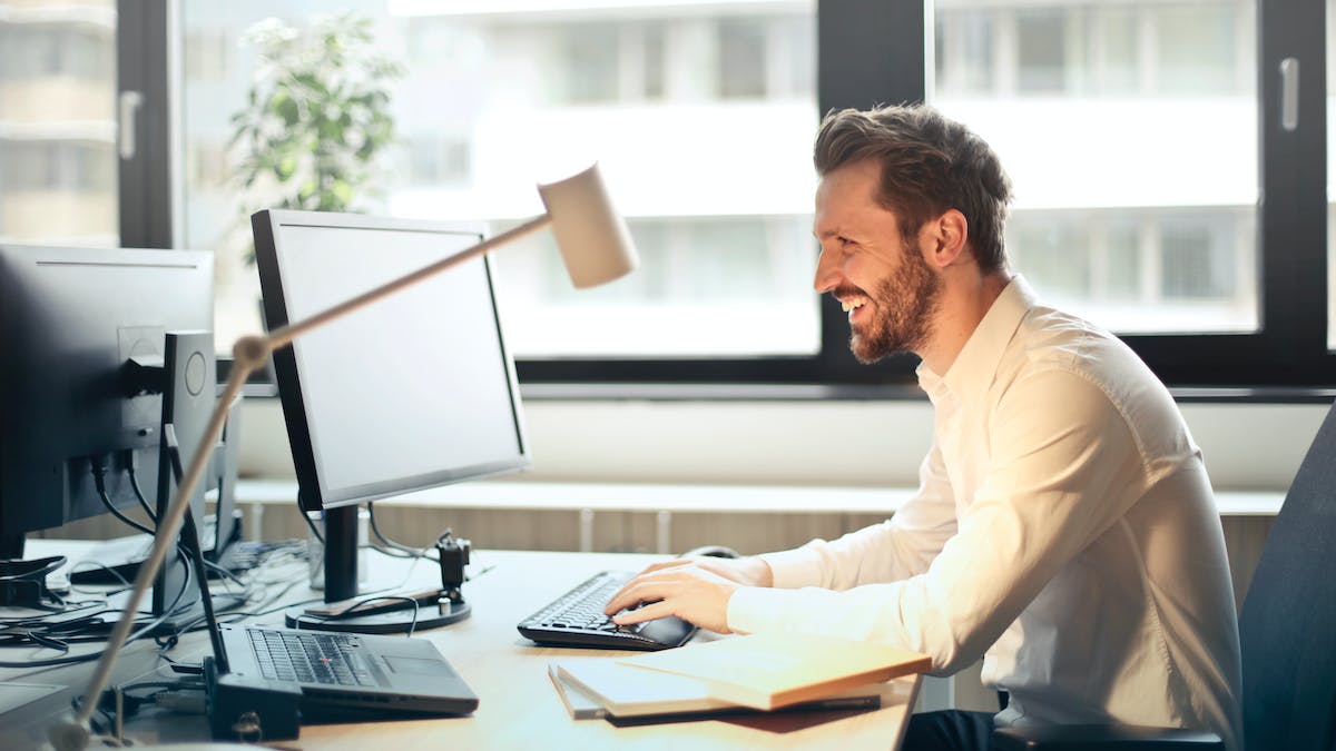 Man writing an email